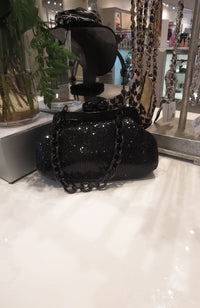Nora Curvey Clutch in Black